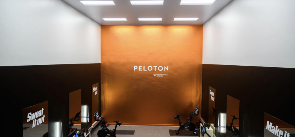 an interior shot of a Peloton branded gym at University of Texas